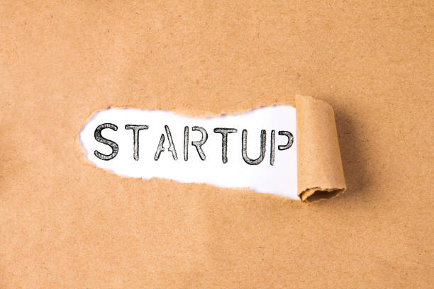 istock the Torn brown the  recycle Paper and STARTUP text with white background 873898288