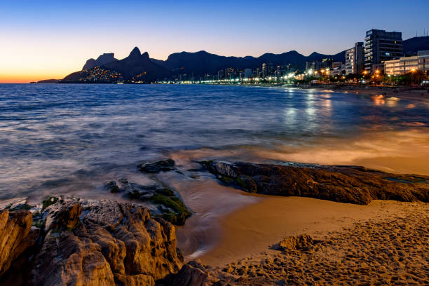 istock Night arriving at the Arpoador stone, Ipanema beach in Rio de Ja 873898482