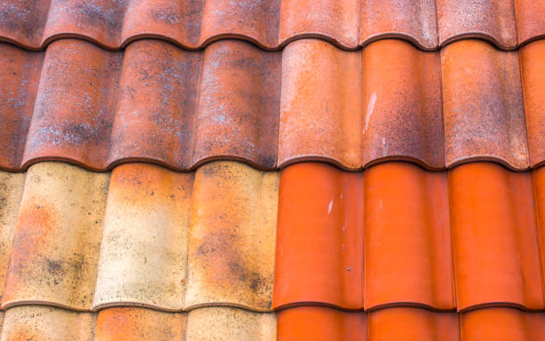 istock Red plastic roof tiles home 873898552
