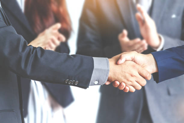 istock Handshake of business partners 873898794