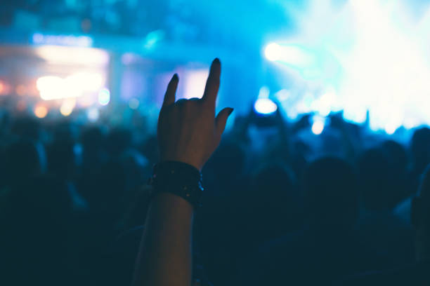 istock The audience watching the concert on stage. 873902172