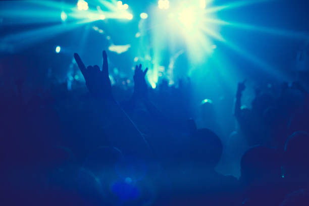istock The audience watching the concert on stage. 873902678