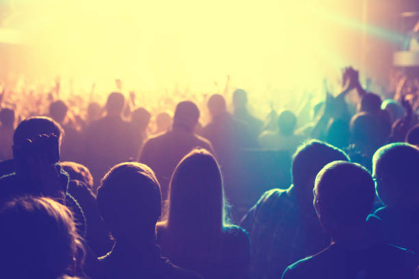 istock The audience watching the concert on stage. 873902884