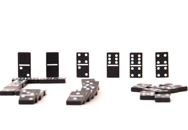 istock Black Domino tiles on white background 873902924