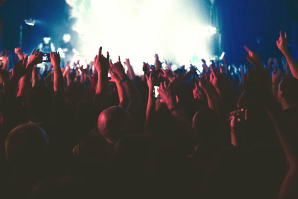 istock The audience watching the concert on stage. 873903674