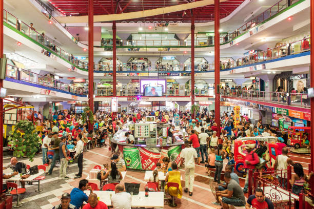 Havana, Cuba - January 21, 2017: Many people enjoy their meal or go shopping in a huge shoppingmall.
