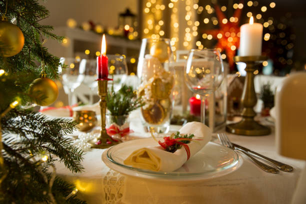 istock Beautiful served table with Christmas decorations, candles and lanterns 873906334