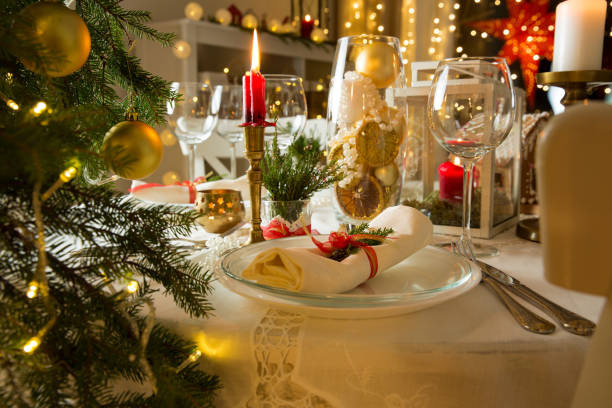 istock Beautiful served table with Christmas decorations, candles and lanterns 873906494