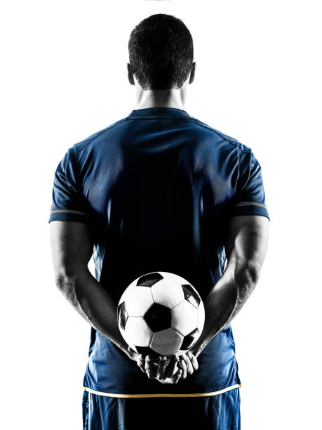 calciatore uomo in piedi silhouette isolato - little boys people indoors soccer foto e immagini stock