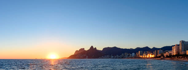 istock Night arriving at the Arpoador stone, Ipanema beach in Rio de Ja 873913056