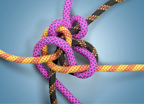 Rope. Knot on a colorful cord on light background lace fastener photos stock pictures, royalty-free photos & images