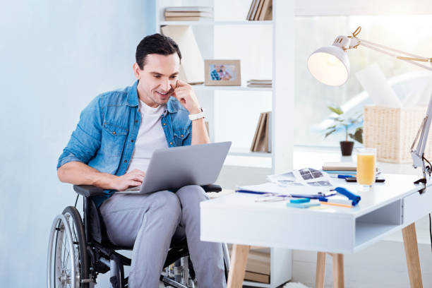 istock Enigmatical male person working with computer 873921444