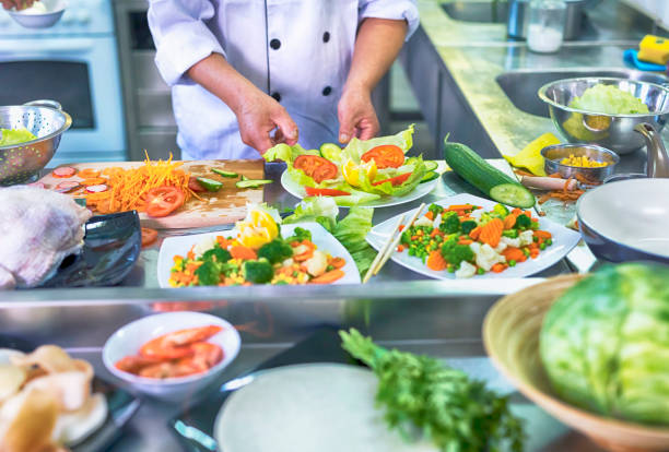 istock Chef preparing salad in chinese restaurant 873924536