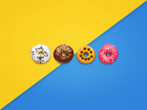 istock Sweet doughnuts on colorful background 873927508