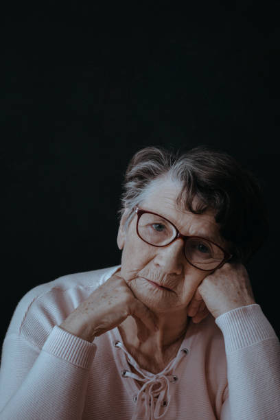 istock Worried lonely elderly woman 873930444