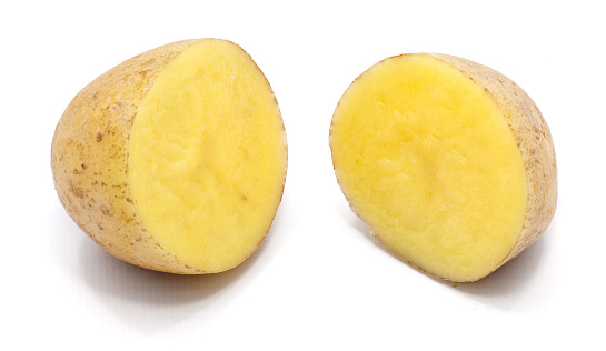 Two potato halves isolated on white background\