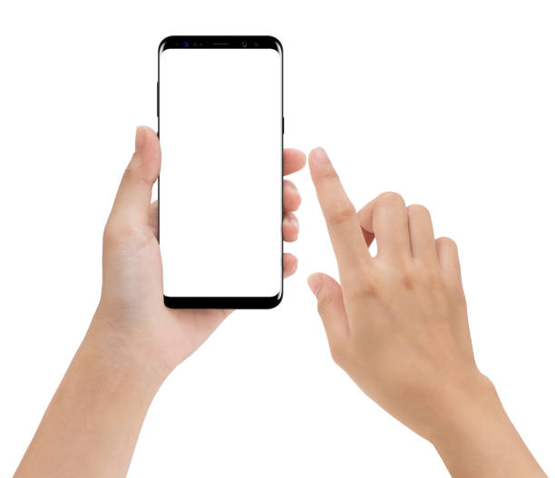 крупным планом руку провести и касаясь телефона мобильных изолированных белый фон - pointing human hand aiming human finger стоковые фото и изображения