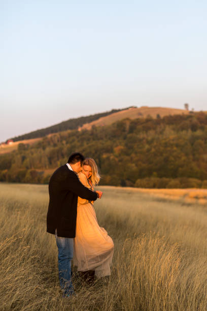 istock Young couple in nature 873937816