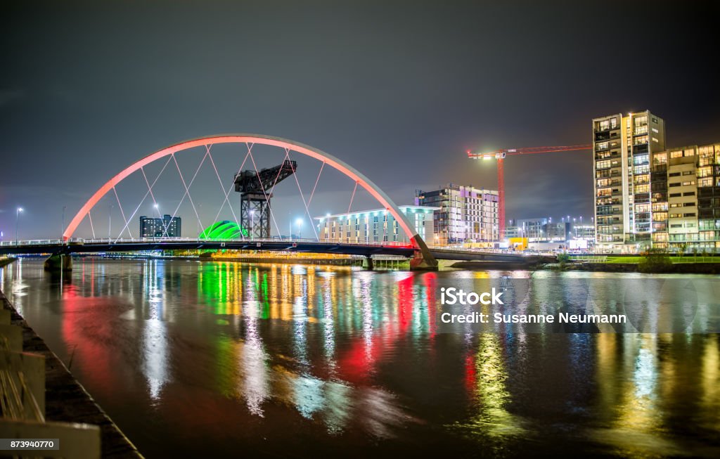 Clyde Arc and Glasgow Skyline at Night Night View of the Clyde Arc and the Skyline of Glasgow Glasgow - Scotland Stock Photo