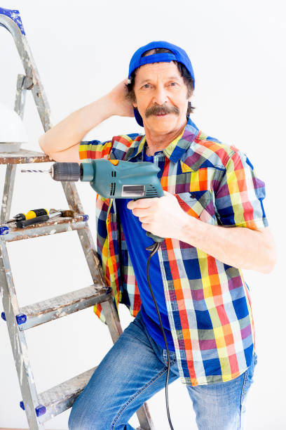 istock Guy with repair rools 873941868