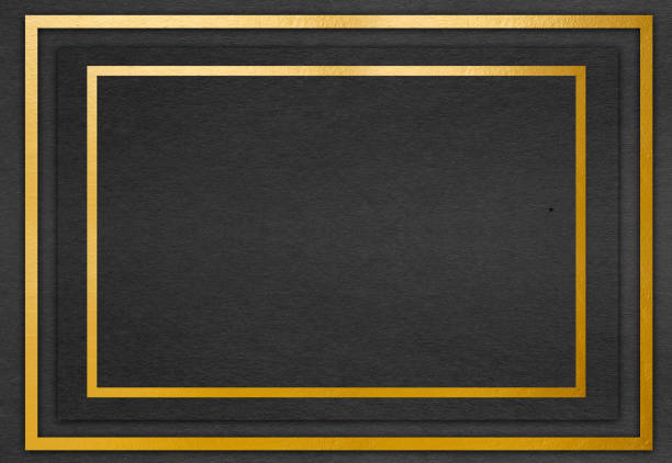 istock golden frame on black paper background 873945132