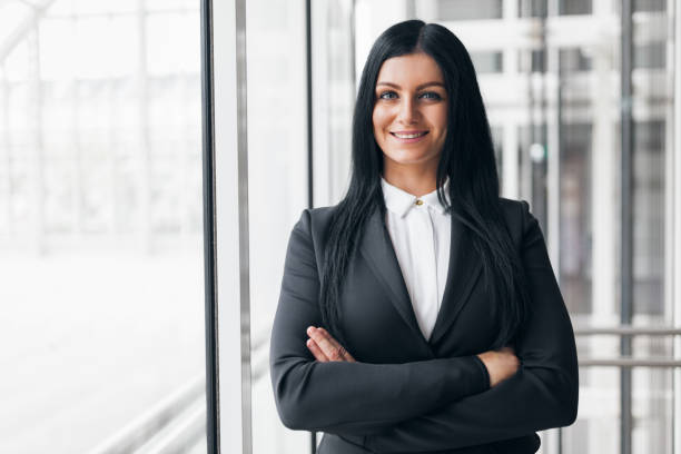istock Successful confident business woman in an office setting 873945812