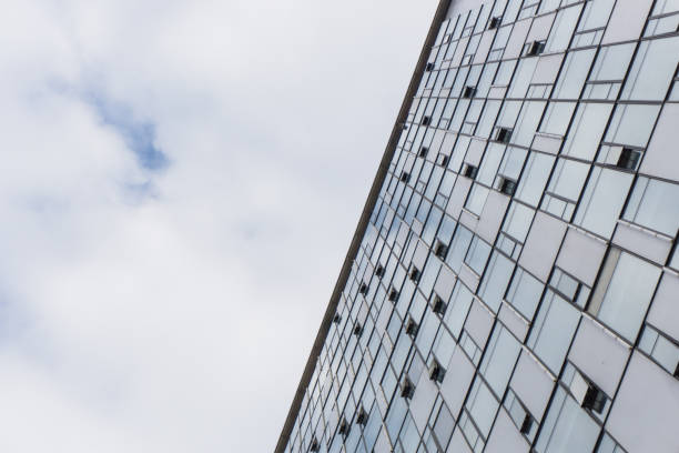 istock City skyscrapers and blue sky and white clouds. 873947258