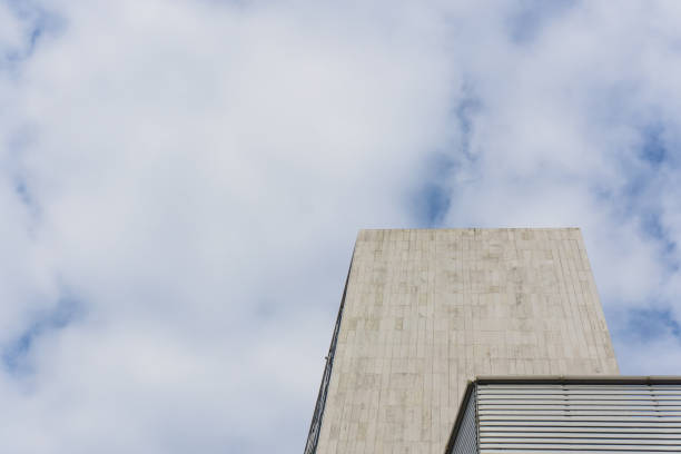 istock City skyscrapers and blue sky and white clouds. 873949572