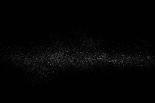 Powder glitter on black background for overlay