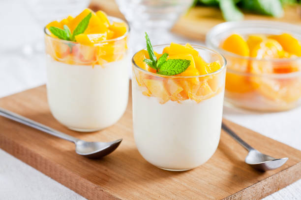 istock Glasses Of Yogurt With Poached Peach 873956922
