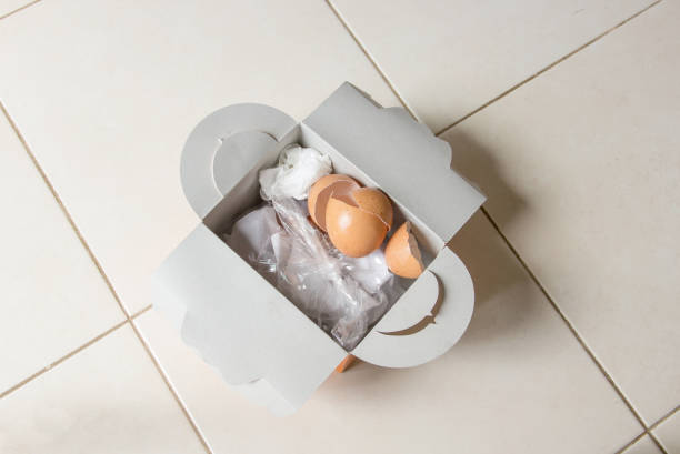 istock food waste in paper box 873957206