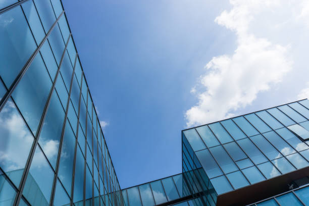 istock City skyscrapers and blue sky and white clouds. 873957284