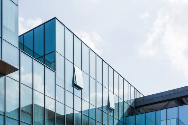 istock City skyscrapers and blue sky and white clouds. 873957474