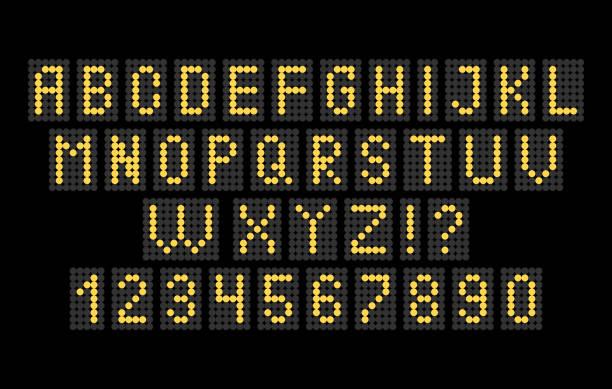 istock Alphabet and numbers of light on a black background. 873957660
