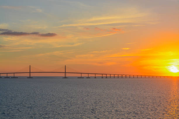 istock Sunshine Skyway Bridge Silhouette on Tampa Bay, Florida 873960726