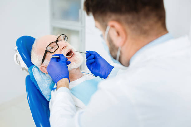 istock Close up of attentive dentist at work 873960866