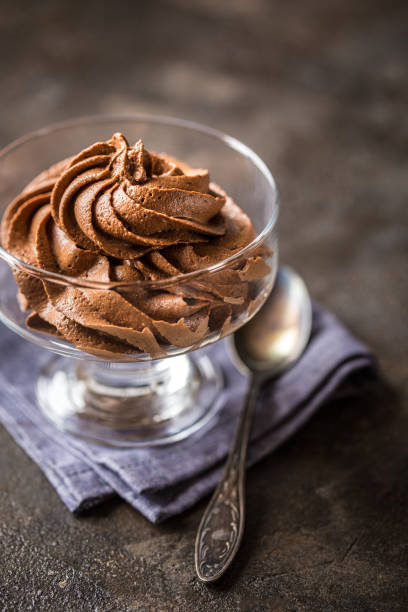 istock chocolate mousse cream in a glass vase 873962488
