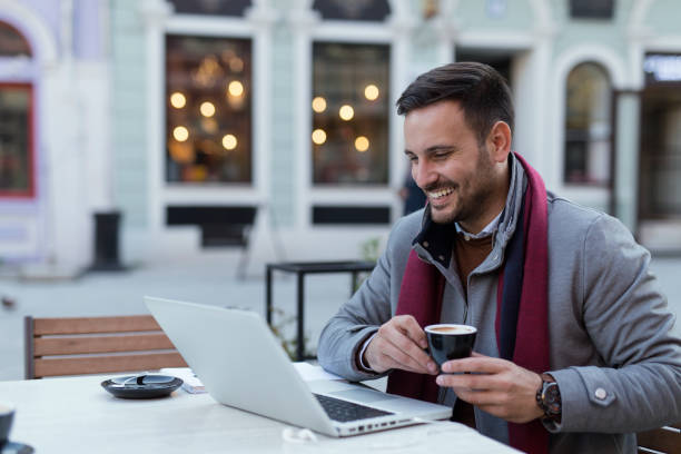 istock Businessman at coffee shop 873965522