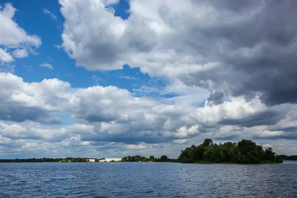 Photo of beautiful clouds over the water