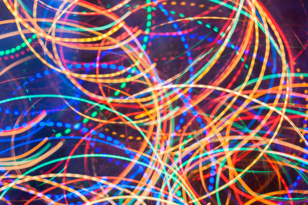 istock Abstract background. Bright glowing multicolored spiral twisted lines. 873972746