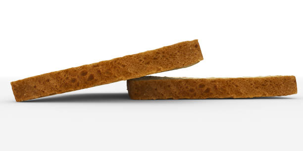 istock bread slices - toast pair, low angle view - isolated on white 873973168
