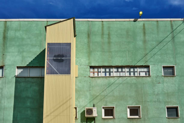 istock Facade of an industrial building 873976344