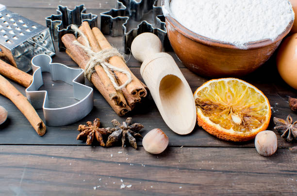 istock Cutting the gingerbread cookie dough for Christmas and New Year 873976996