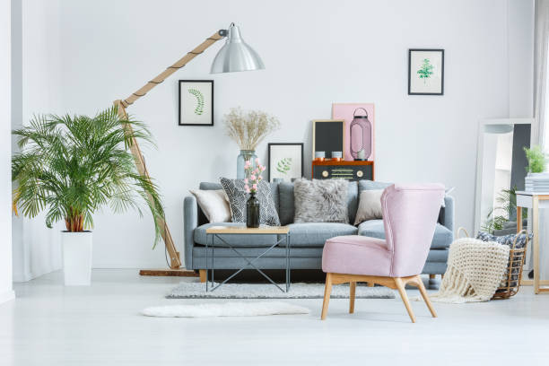 istock Bright room with watercolor pictures 873997090