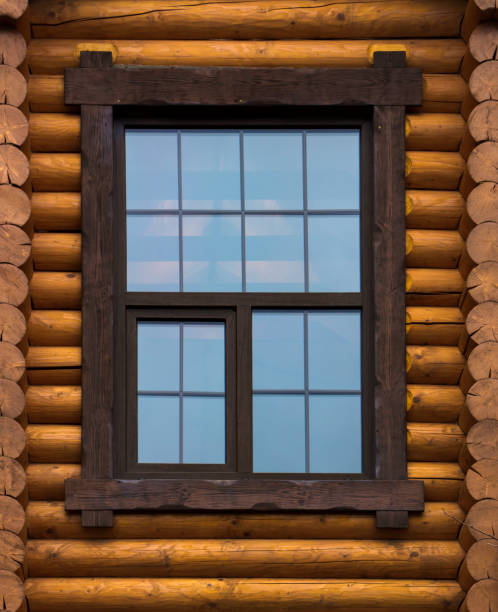 istock Vintage window on wooden wall background 873997172