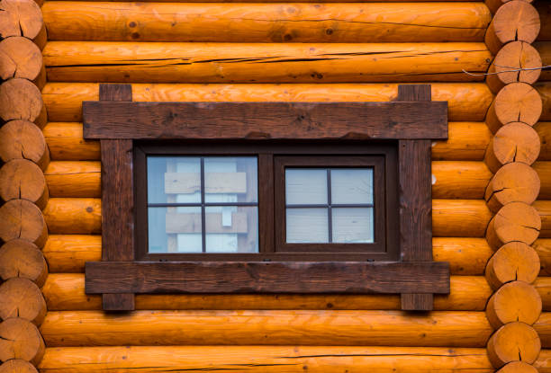 istock Vintage window on wooden wall background 873997290