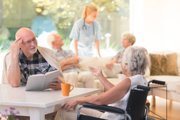 istock Senior woman talking with friend 874001662