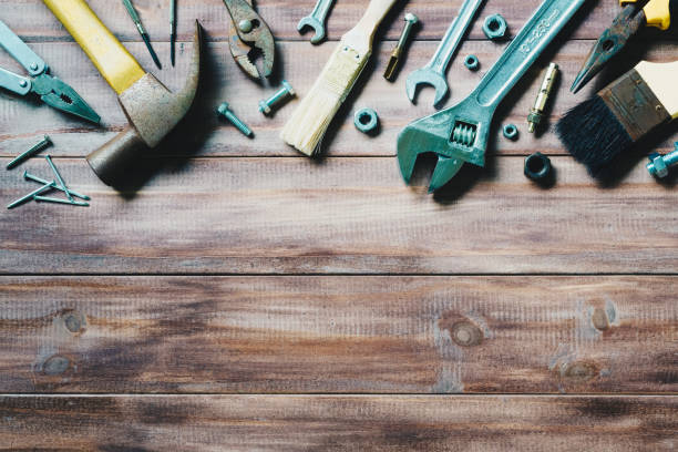 istock grungy old tools on a wooden background 874006694