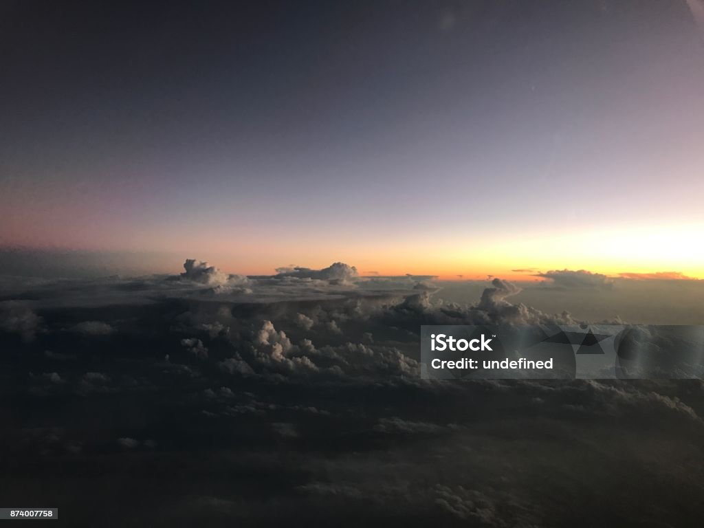 Sunset Sky Clouds taken at sunset from a Hawker 400 aircraft Aerial View Stock Photo