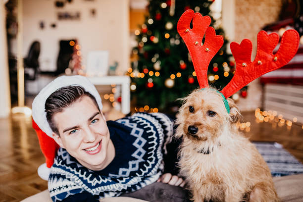 istock Young handsome man taking a selfie with his dog 874016692